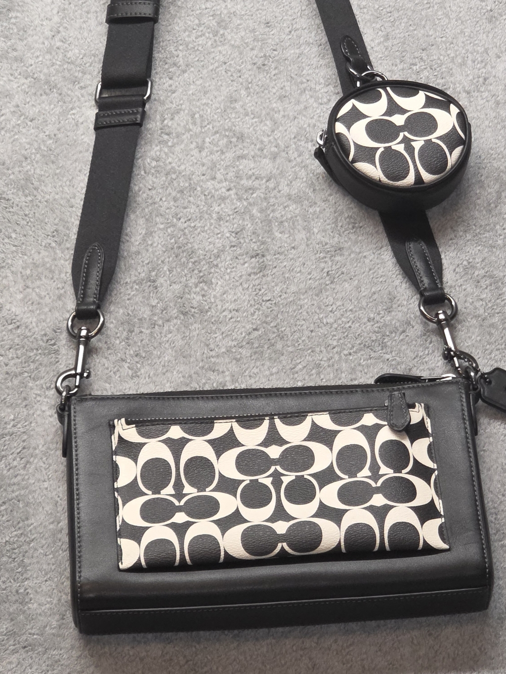 Coach Holden Black and White Signature Crossbody with Detachable Coin Pouch.